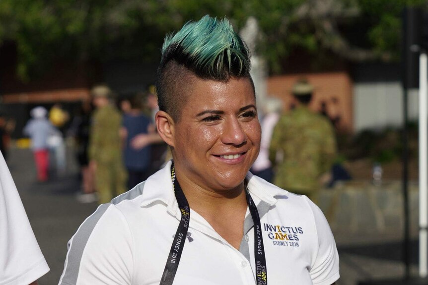 A woman in an Invictus Games uniform