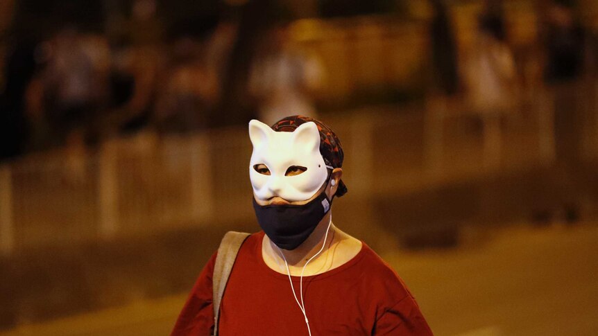 Man in cat mask