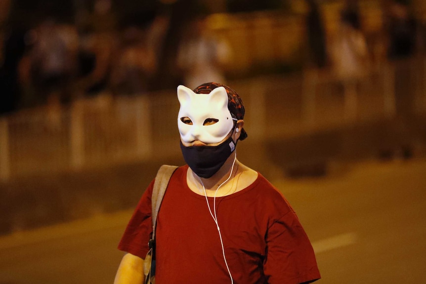 Man in cat mask