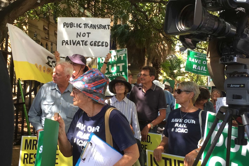 Hunter residents protest outside NSW Parliament against changes to the railway services into Newcastle