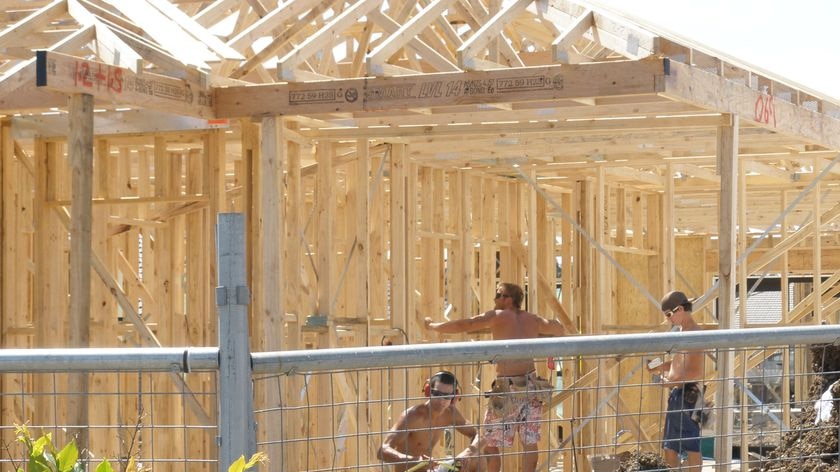 Workers go about their duties on a north-west Sydney building site.