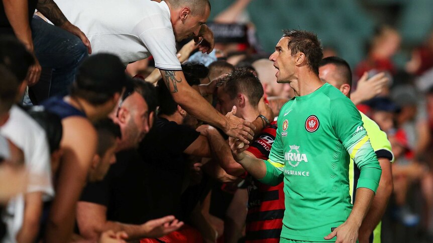 Covic argues with fans