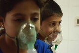 Children were among the alleged victims of what Syrian activists say was a gas attack in Damascus.