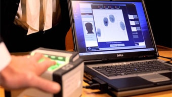 A biometric acquisition system is displayed in Canberra (AAP/Alan Porritt)