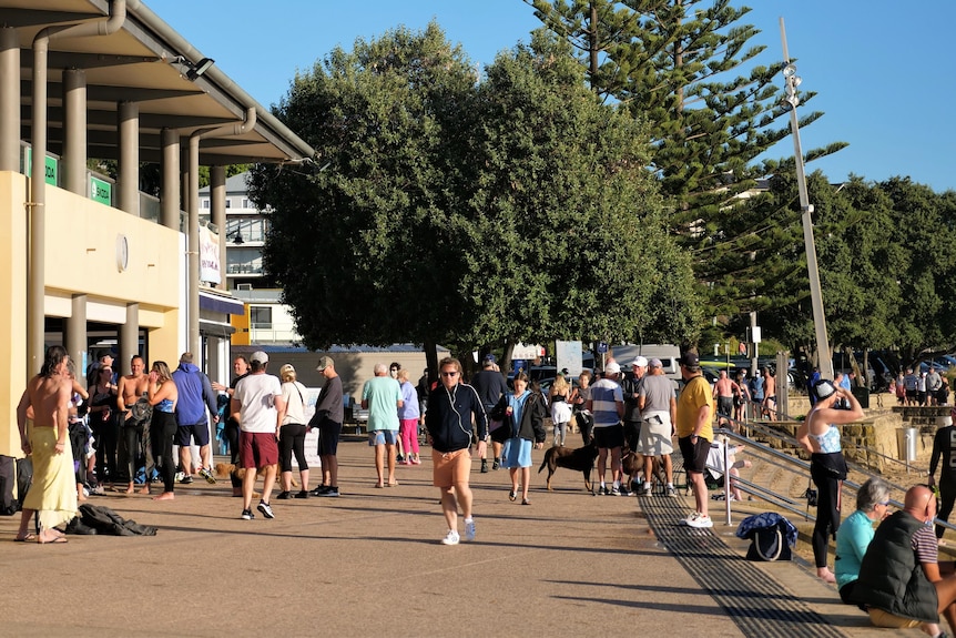 A crowd of walkers at Terrigal Beach