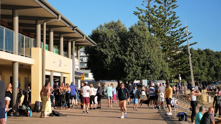 A crowd of walkers at Terrigal Beach