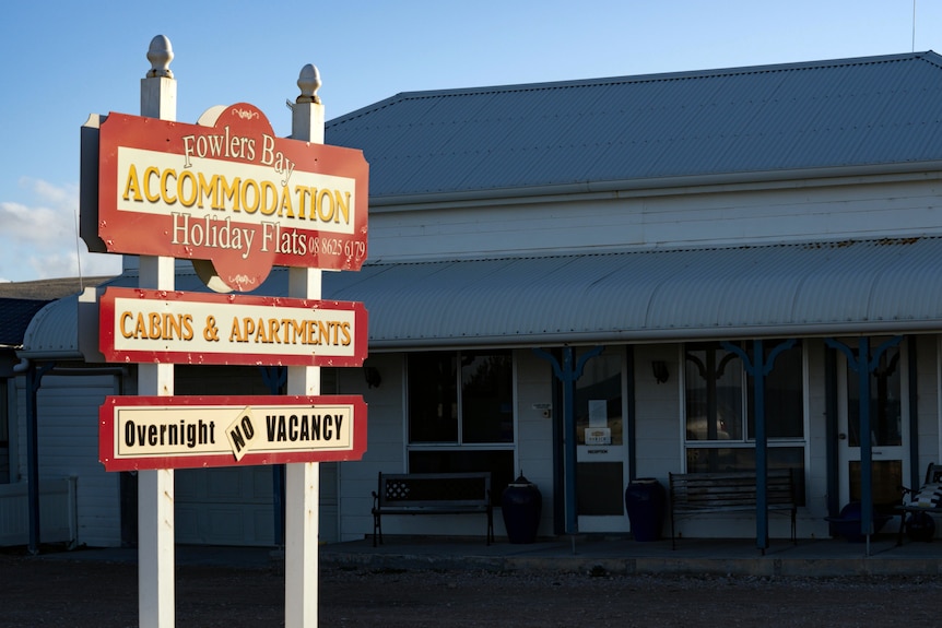 A welcome sign outside a hotel.