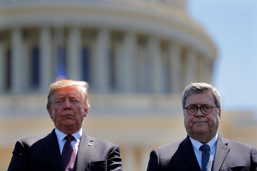Donald Trump and William Barr in front of the US Capitol building