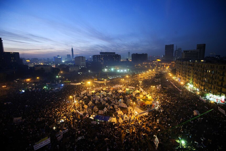 Tens of thousands of protesters gather in Egypt's landmark Tahrir square against a decree by President Mohamed Morsi.