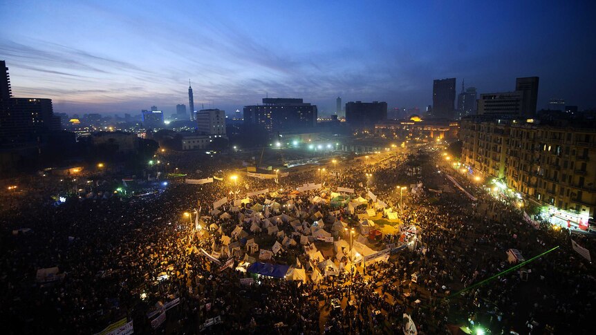 Tens of thousands of protesters gather in Egypt's landmark Tahrir square against a decree by President Mohamed Morsi.