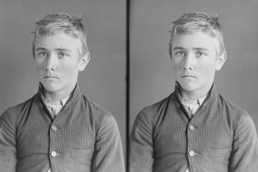 Black and white court/police photograph of a teenaged boy from the 1800s.