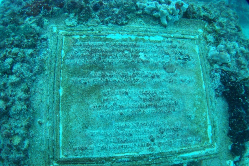 A plaque underwater at the Neptune Memorial Reef, Florida, United States