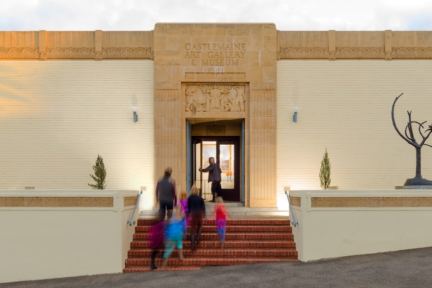 Gallery attendees ascend the steps toward the entrance of the Castlemaine Art Museum in 2017.