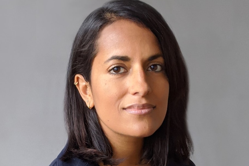 A headshot of a woman. 