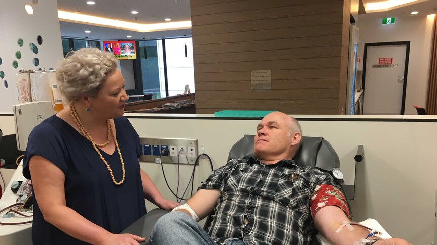 Paul Harvey donates blood