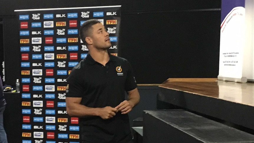 Jarryd Hayne looks at the screen at Robina High School