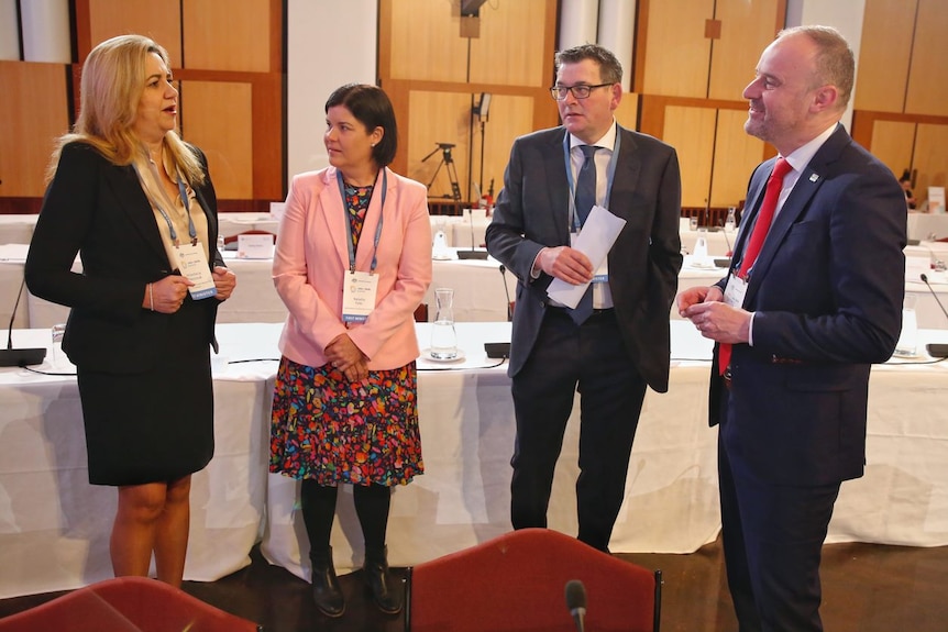 Annastacia Palaszczuk, Natasha Fyles, Daniel Andrews and Andrew Barr have a discussion in the Great Hall of Parliament House
