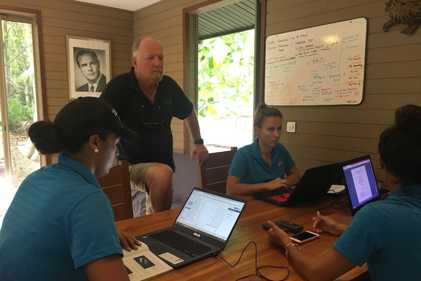 Inside the Tetiaroa Society's ecostation on Onetahi, with a black and white picture of Marlon Brando