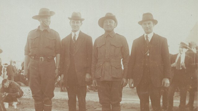 (second from left) photographed during WWI