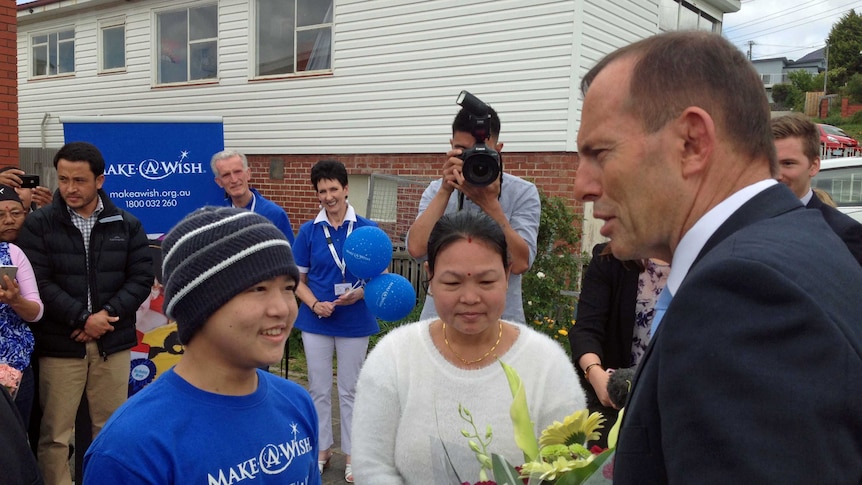 Refugee Surjen Magar and his mother meet the Prime Minister, Tony Abbott.