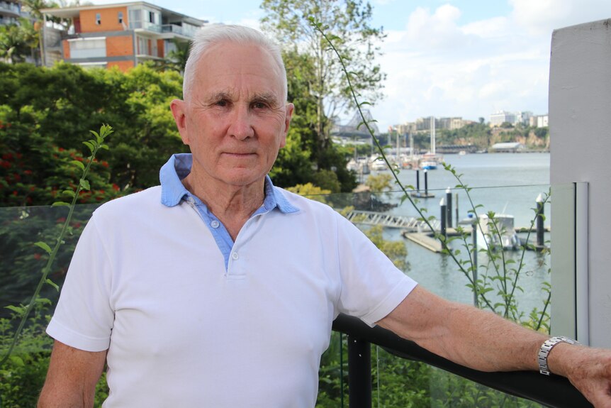 Kangaroo Point resident John Mowbray with Brisbane River and Story Bridge behind him