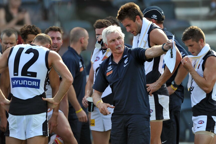 Laying down the law ... Carlton head coach Mick Malthouse tries to spark up his players during the preseason cup clash with GWS.