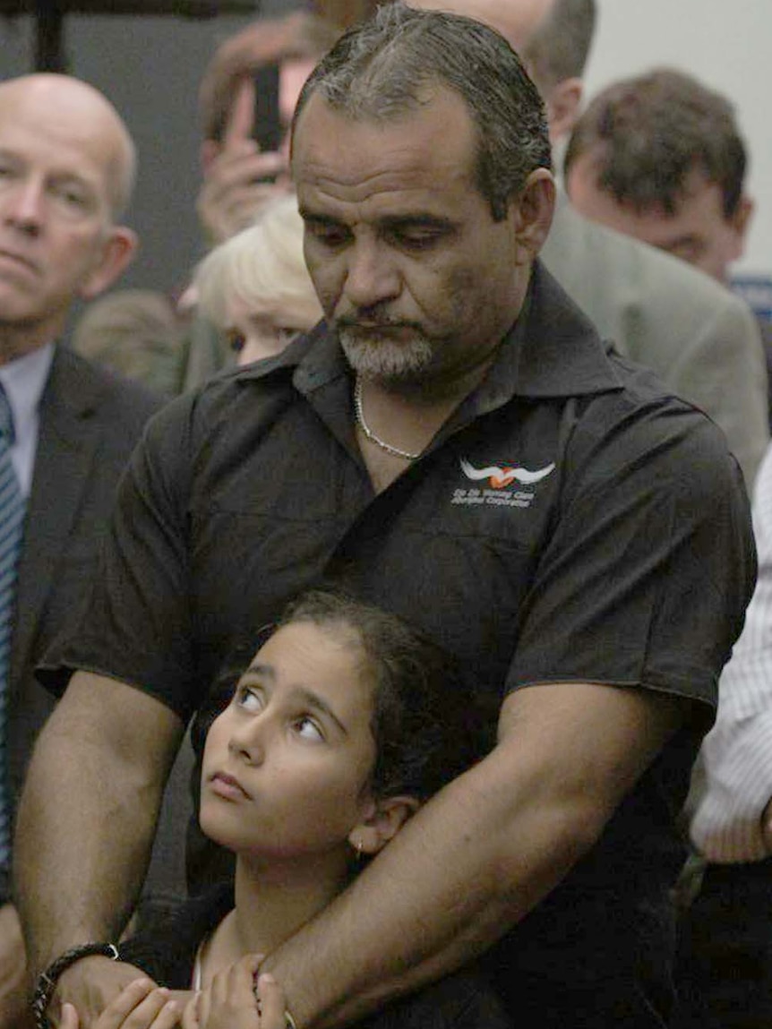 Rick Kerr and his daughter Tori listen at a Native Title hearing in Bendigo