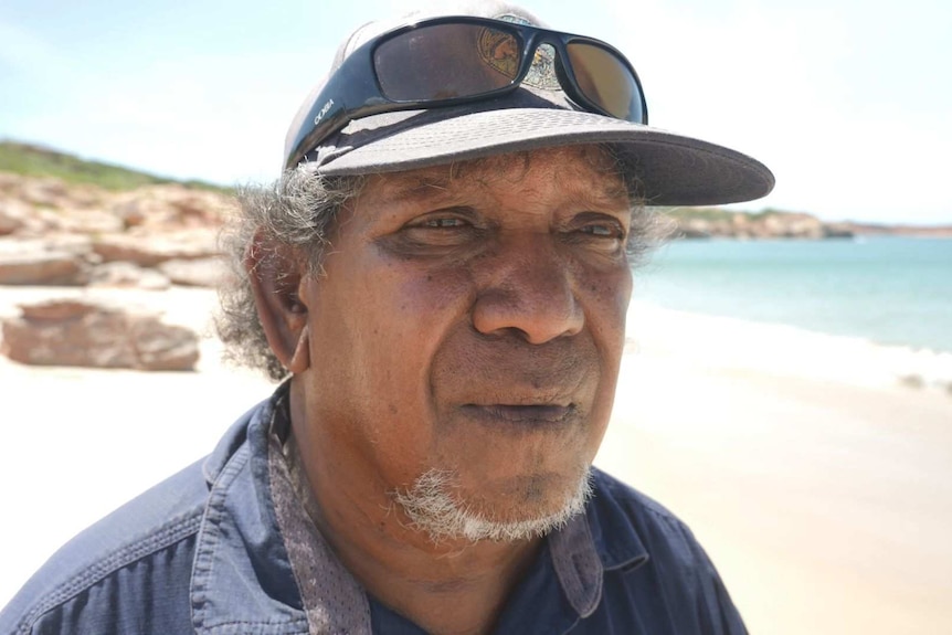 Kevin George looks out to sea in his ranger uniform at Kooljaman