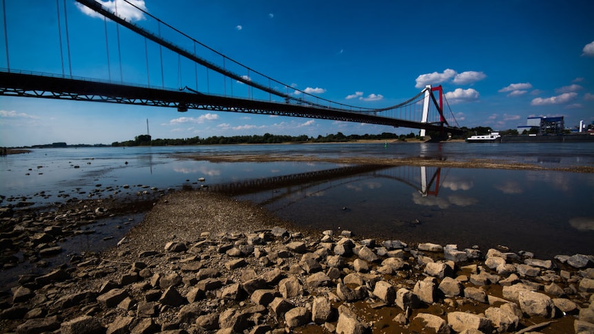 Blue skies, a bridge and a dry river bed along the Rhine River