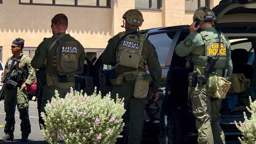 law enforcement work at the scene of the El Paso shooting