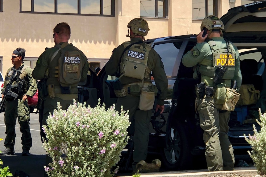 law enforcement work at the scene of the El Paso shooting