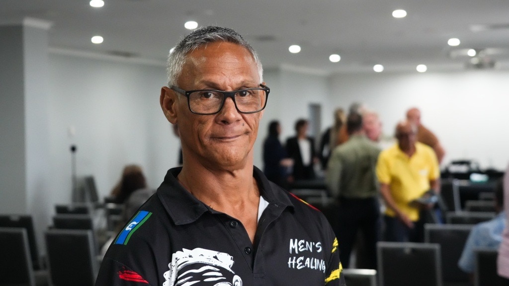 indigenous man wearing glasses close up shot
