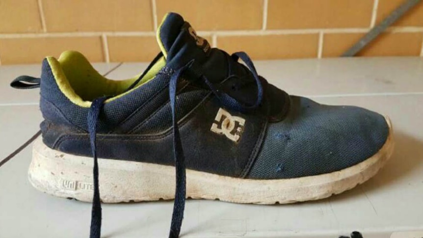 Injured man's missing shoe