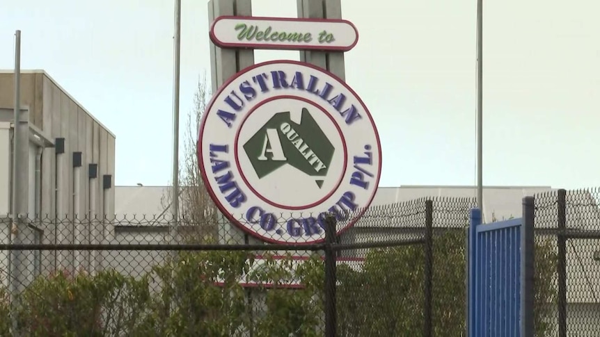 A sign in front of an abattoir reading 'Welcome to Australian Lamb Co. Group"