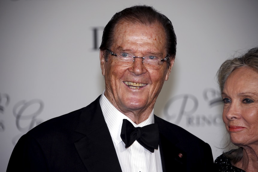 British actor Sir Roger Moore and his wife Kristina Tholstrup arrive at the Princess Grace Awards gala in Monaco.