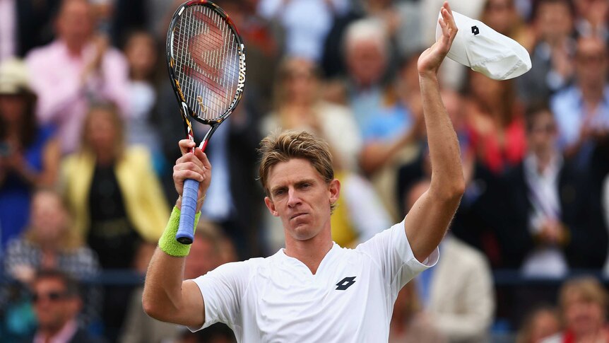 South African Kevin Anderson celebrates victory against Gilles Simon at Queen's Club.