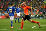 Key role ... Wesley Sneijder celebrates scoring against Brazil