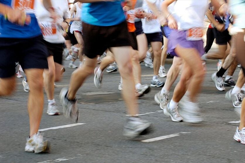 A group of people running in a marathon.