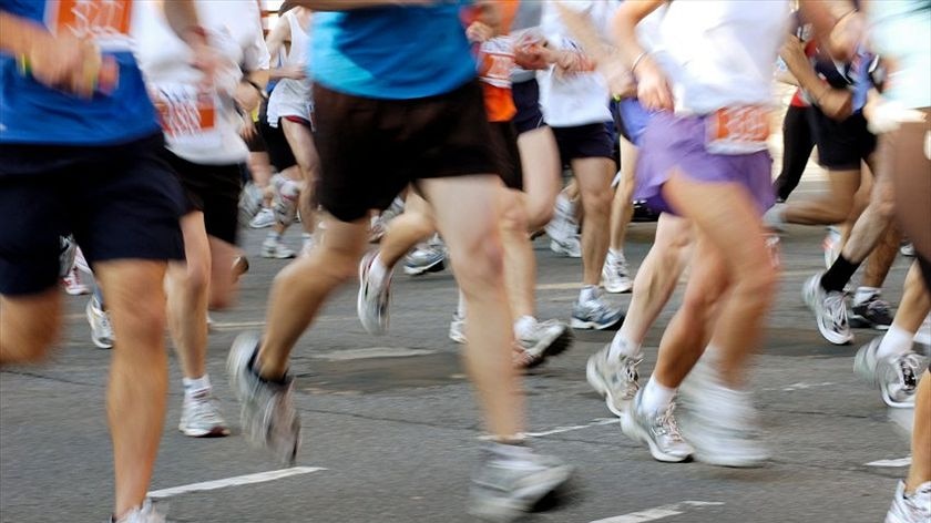 A group of people running in a marathon.