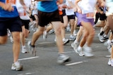 A group of people running in a marathon.