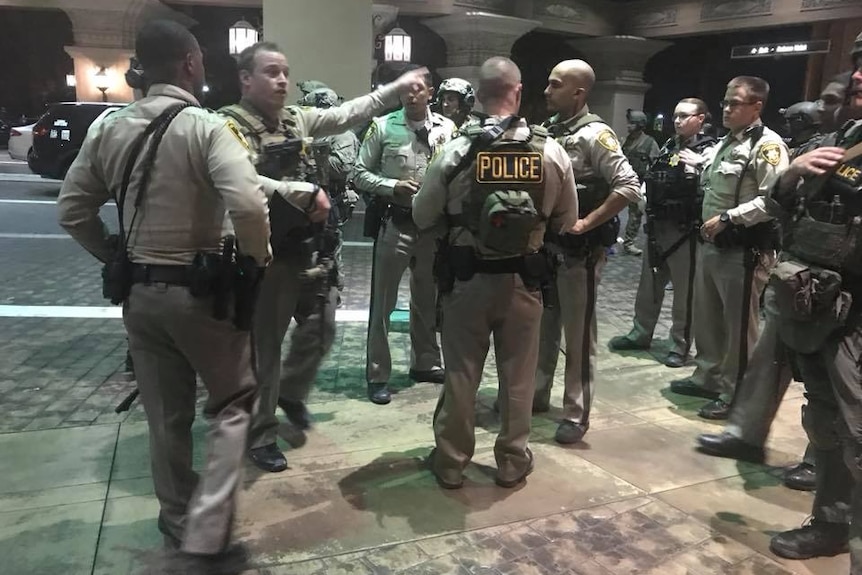 Las Vegas police stand outside the Mandalay Bay Hotel.