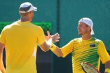 Guccione and Hewitt celebrate doubles win