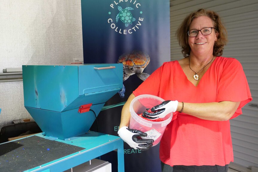 Plastic Collective founder and CEO Louise Hardman with her Shruder machine.