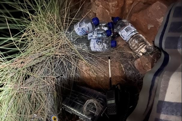 Plastic bottles scattered across a remote indentation in the cliff where Mr Farrelly-Deas was stuck.