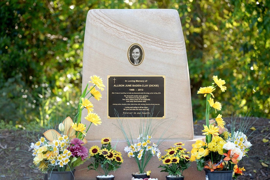 Flowers and toys decorate a memorial for Allison Baden-Clay near Kholo Creek.