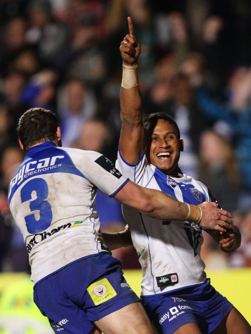 Try time ... Ben Barba celebrates after crossing the stripe against Manly