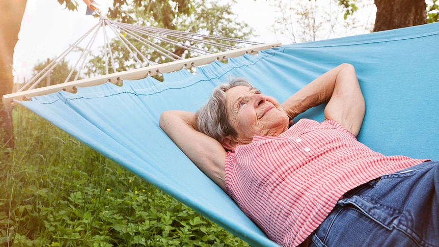 Woman relaxing in a hammock