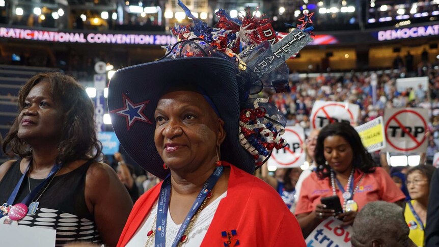 Lavon Bracy wears a large Democrat-themed hat at the Democratic Convention.