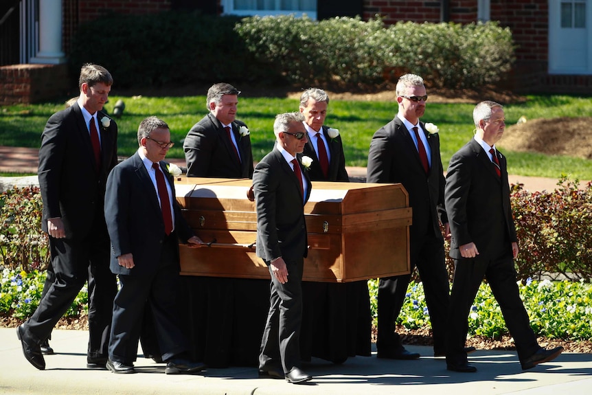 Men carrying a casket