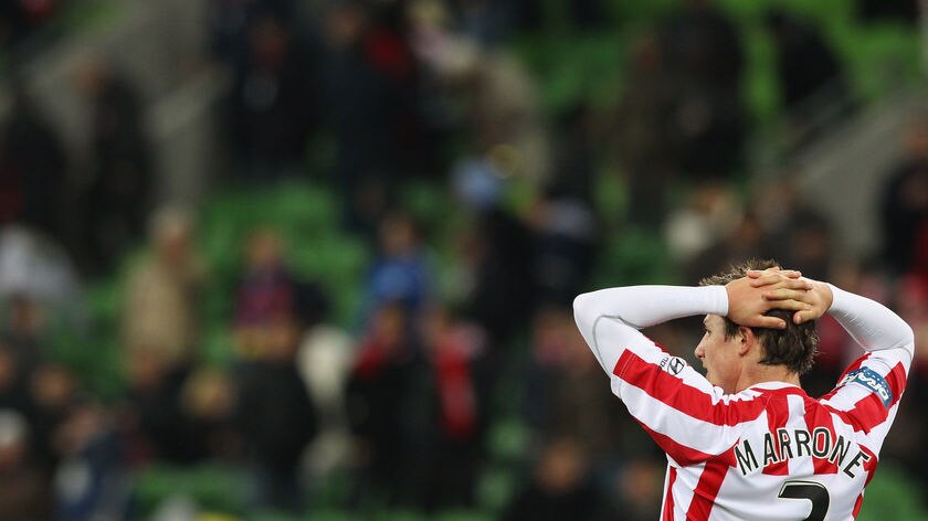 Heart beaten...Melbourne defender Michael Marrone reflects on his club's A-League loss.